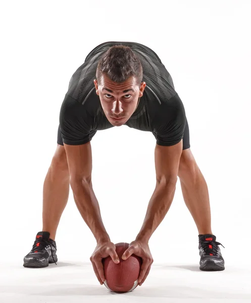 Jogador de rugby segurando uma bola — Fotografia de Stock