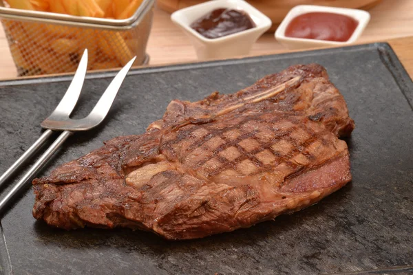 Grilled beef steak on stone — ストック写真