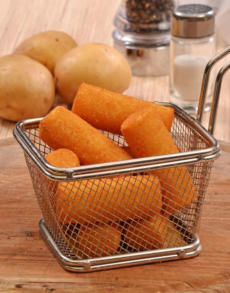 Potatoes croquettes and ingredients — Stock fotografie