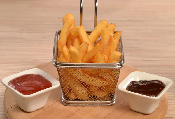 Fried potatoes chest and sauces — Stock Photo, Image