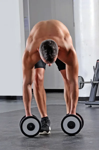 Mężczyzna sport szkolenie z siłowni wagi. — Zdjęcie stockowe
