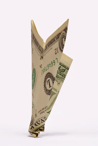 One dollar paper plane — Stockfoto