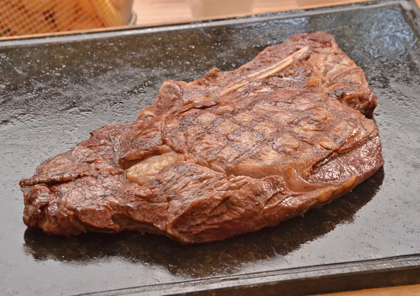 Grilled beef steak on stone — ストック写真