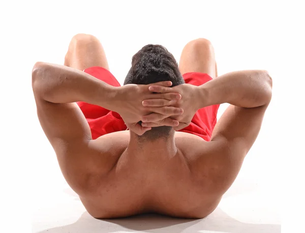 Fitness man doing sit ups Stock Image