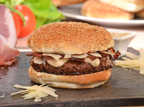 Speck rustic cheese burger Stock Picture