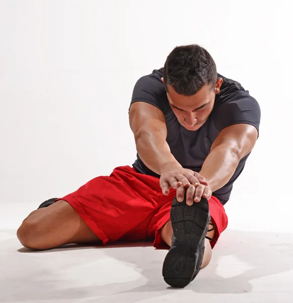 Healthy man stretching — Stock Photo, Image