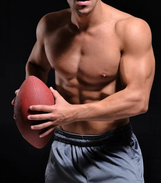 Rugby player holding a rugby ball — Stock Photo, Image