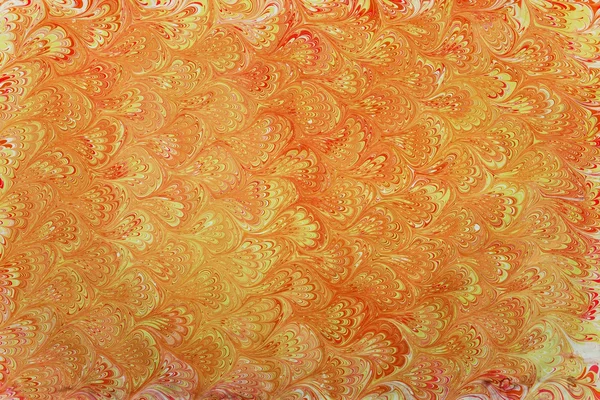 Yellow ebru patterned fan — Stock Photo, Image