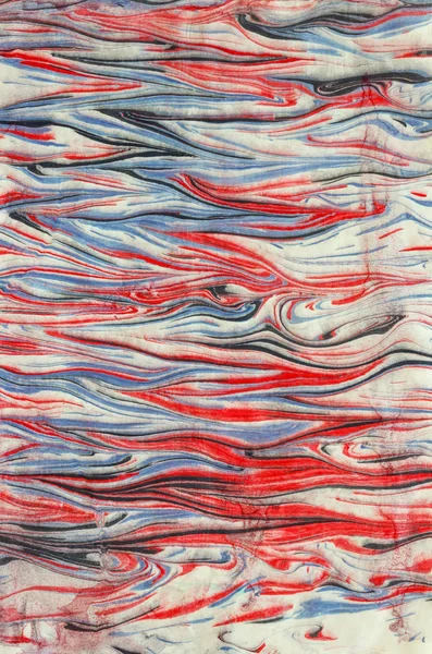 Ebru papel azul ondas vermelhas tintas naturais — Fotografia de Stock