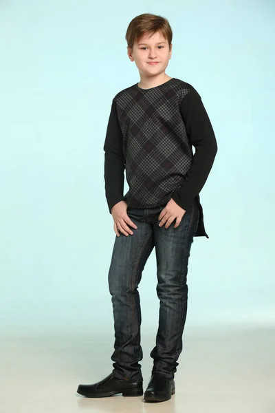 Fashionable Cheerful Considerate Teenage Boy Slightly Smiles Poses Full Length — Stock Photo, Image