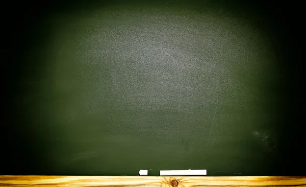 The school or university blackboard with threadbare chalk Royalty Free Stock Photos