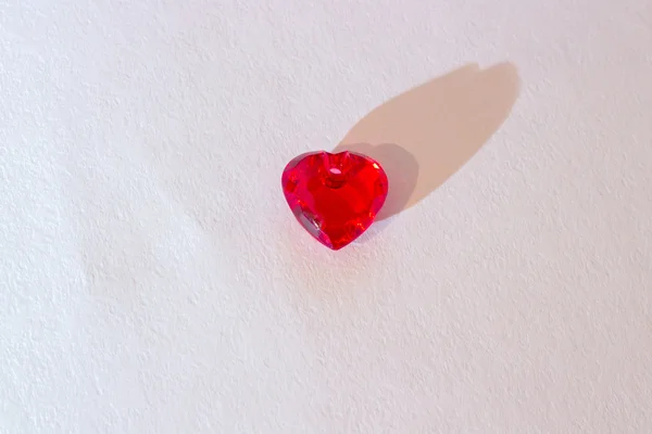 Red heart in the center of water color paper — Stock Photo, Image