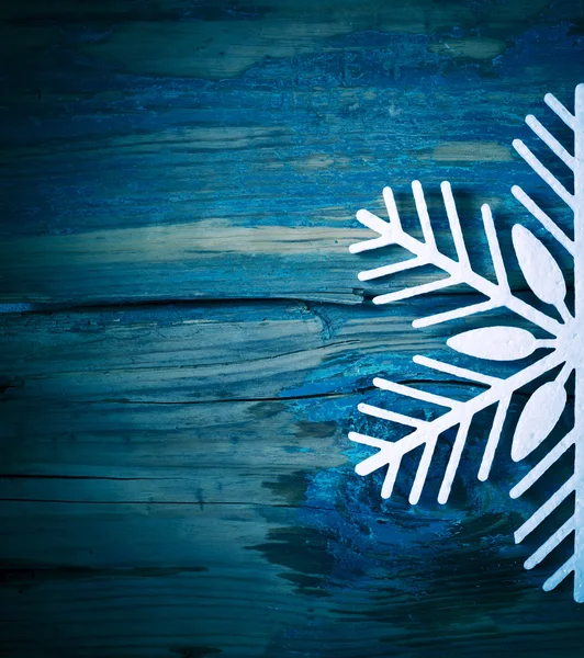 Wooden background with snowflakes — Stock Photo, Image
