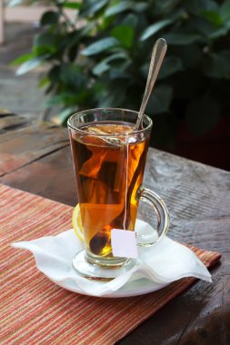 Fincan çay ve bir limon, etkisi bokeah