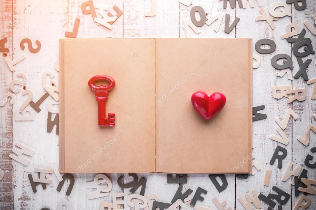 blank page Diary and red old keys with red heart
