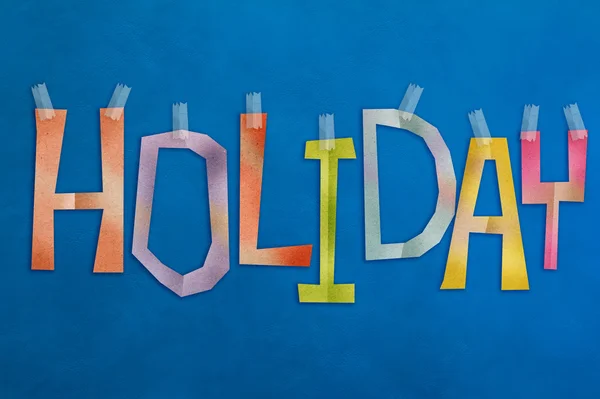 Concetto di vacanza con carta di testo tagliata su sfondo di pelle blu — Foto Stock