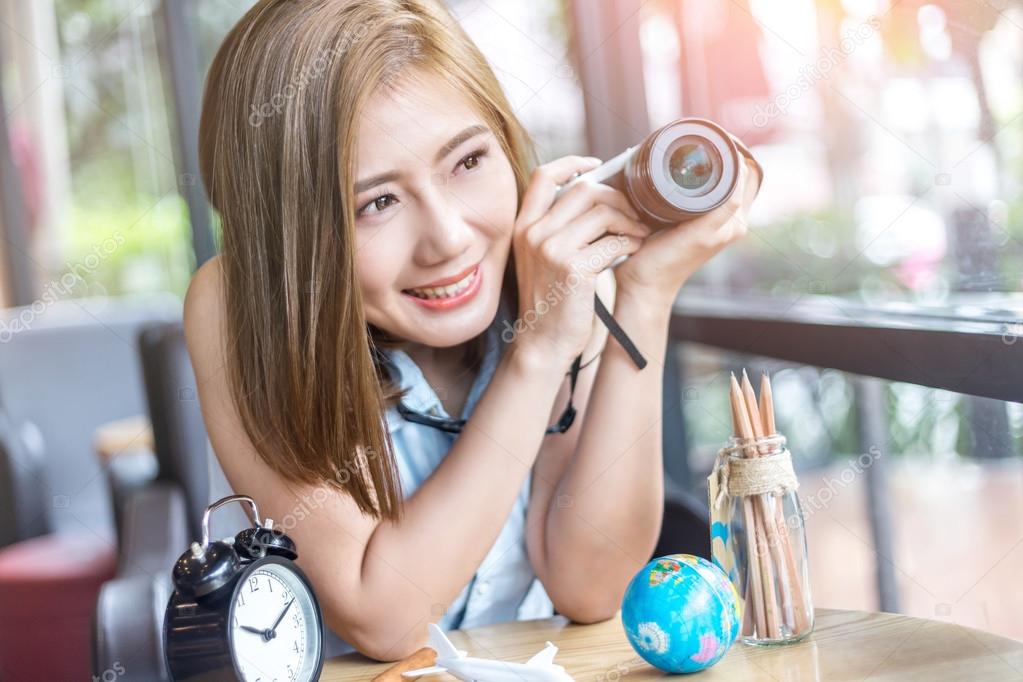 travel concept  beauty asia girl with camera