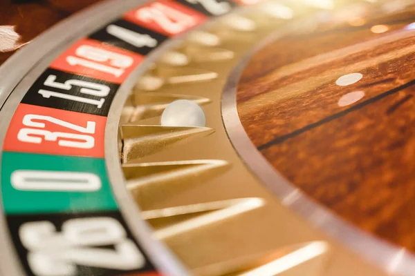 Close up view of roulette wheel with the ball.Gambling wheel in casino