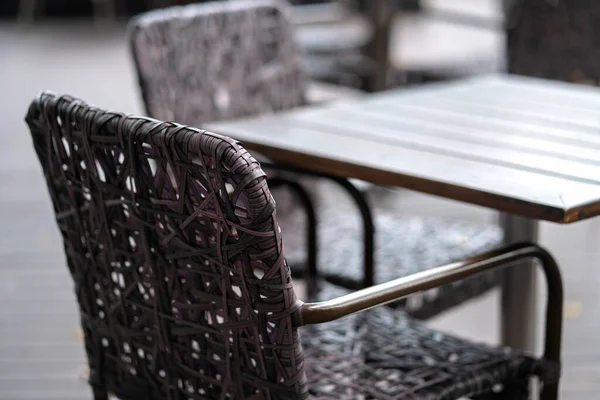 Rattan Wicker Material Fininshing Dining Table Cafe Patio Blur Outdoor — Stock Photo, Image