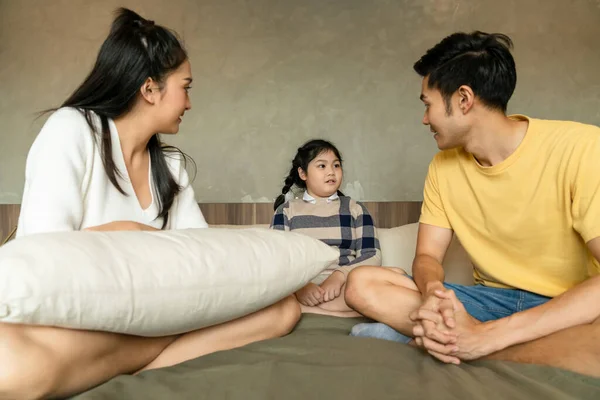 asian family parent and female daughter child sit talk conversation together quarantine weekend i bedroom,family discuss and consult home support and cheer up concept
