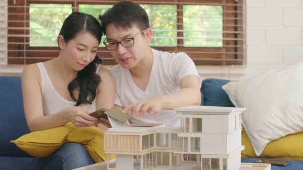 Asian couple marry happy and enjoy new house model design together with laugh and cheerful — Stock Video