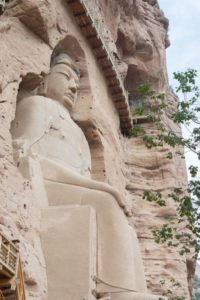 LANZHOU, CHINA - 30 de setembro de 2014: Estátuas de Buda no Templo das Cavernas de Bingling (Patrimônio Mundial da UNESCO). um templo famoso em Lanzhou, Gansu, China . — Fotografia de Stock