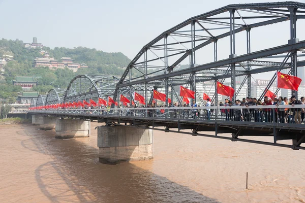 LANZHOU, CHINA - OCT 2 2014: Sun Yat-Sen Bridge (Zhongshan Qiao). a famous First Bridge across the Yellow River in Lanzhou, Gansu, China.