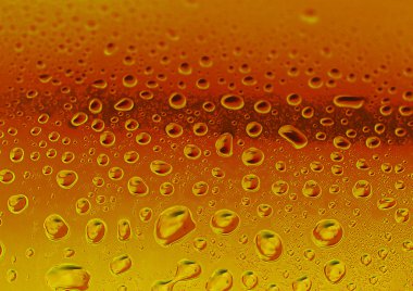 Arka plan olarak altın kırmızı su damlaları