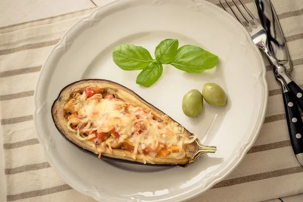 Filled and grilled eggplant half — Stock Photo, Image