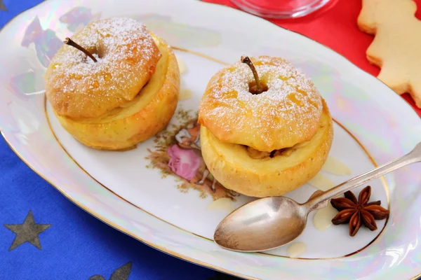 Two baked apples as Christmas Dessert — Stock Photo, Image