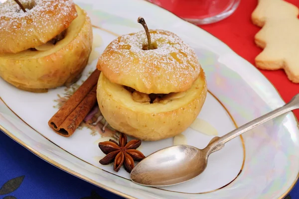 Two baked apples as Christmas dessert — Stock Photo, Image