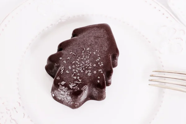 Chocolate ice dessert in form of Christmas tree — Stock Photo, Image