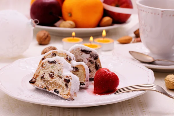 Christmas stollen cake with winter fruit — Stock Photo, Image