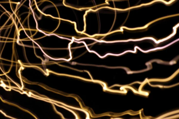 Abstrato linhas de luz de energia turva no fundo escuro — Fotografia de Stock