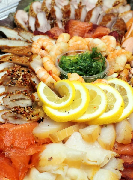 Prawn, fish slices assortment on Party plate — Stock Photo, Image