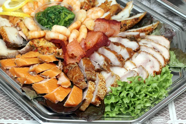 Shrimps, fish slices assortment on Party plate — Stock Image Shrimps, fish slices assortment on Party plate Stock Image