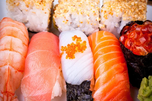 Various fish sushi with salmon ikura — Stock Photo, Image