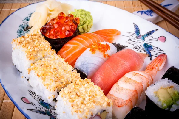 Various fish sushi with salmon ikura — Stock Photo, Image