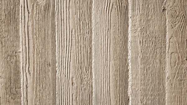 Gray concrete wall with wooden relief embossing — Stockfoto