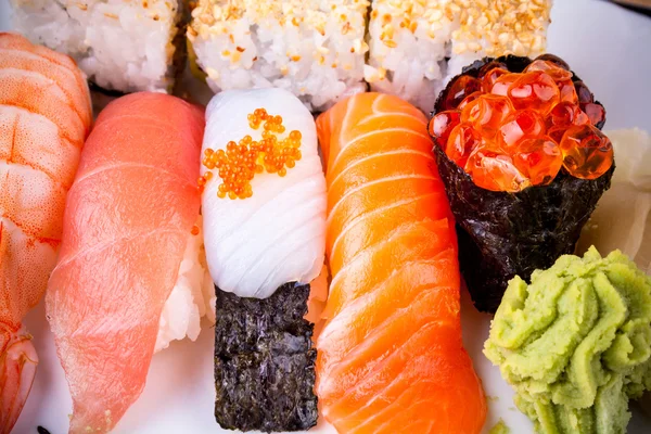 Various fish sushi with salmon ikura, close up — Stock Photo, Image