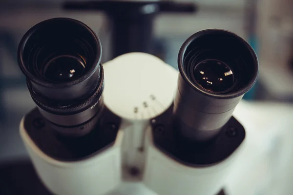 Microscope eyepiece closeup as background — Stock fotografie