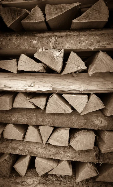 Neatly stacked wood as background — Stock Photo, Image