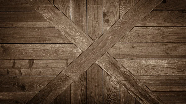 Old wooden cross board wall as background — Stock Photo, Image