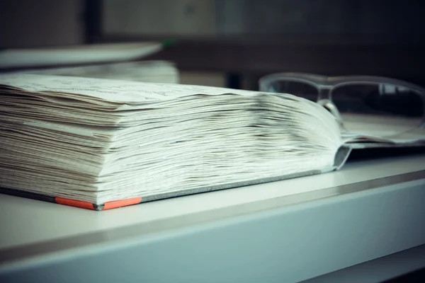 Thick Laboratory Journal with goggles — Stock Photo, Image