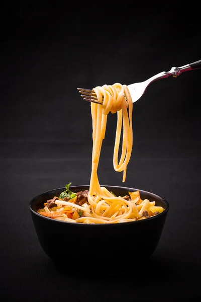 Uzbek noodle soup Lagman with fork — Stock Image Uzbek noodle soup Lagman with fork Stock Picture