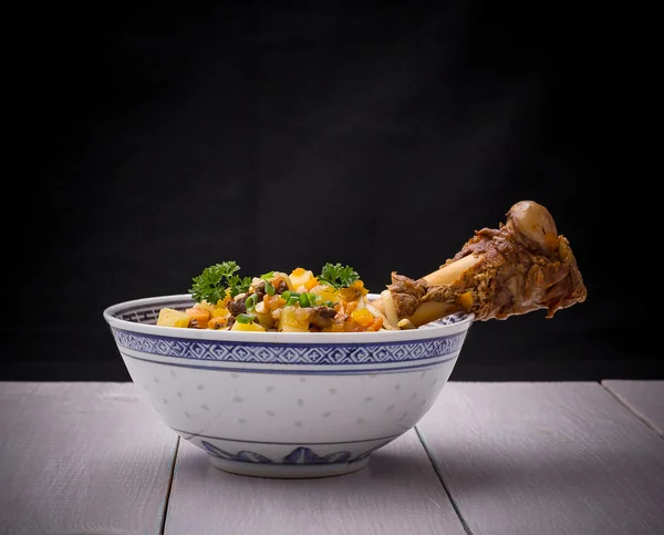 Uzbek noodle soup Lagman with large bone — Stock Image Uzbek noodle soup Lagman with large bone Stock Picture