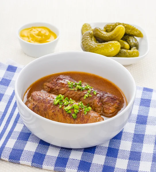 Two roulades beef in bowl with sauce — Stock Photo, Image