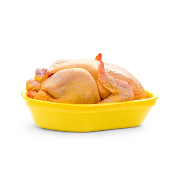 Pollo alimentado con maíz en bandeja de embalaje amarillo — Foto de Stock