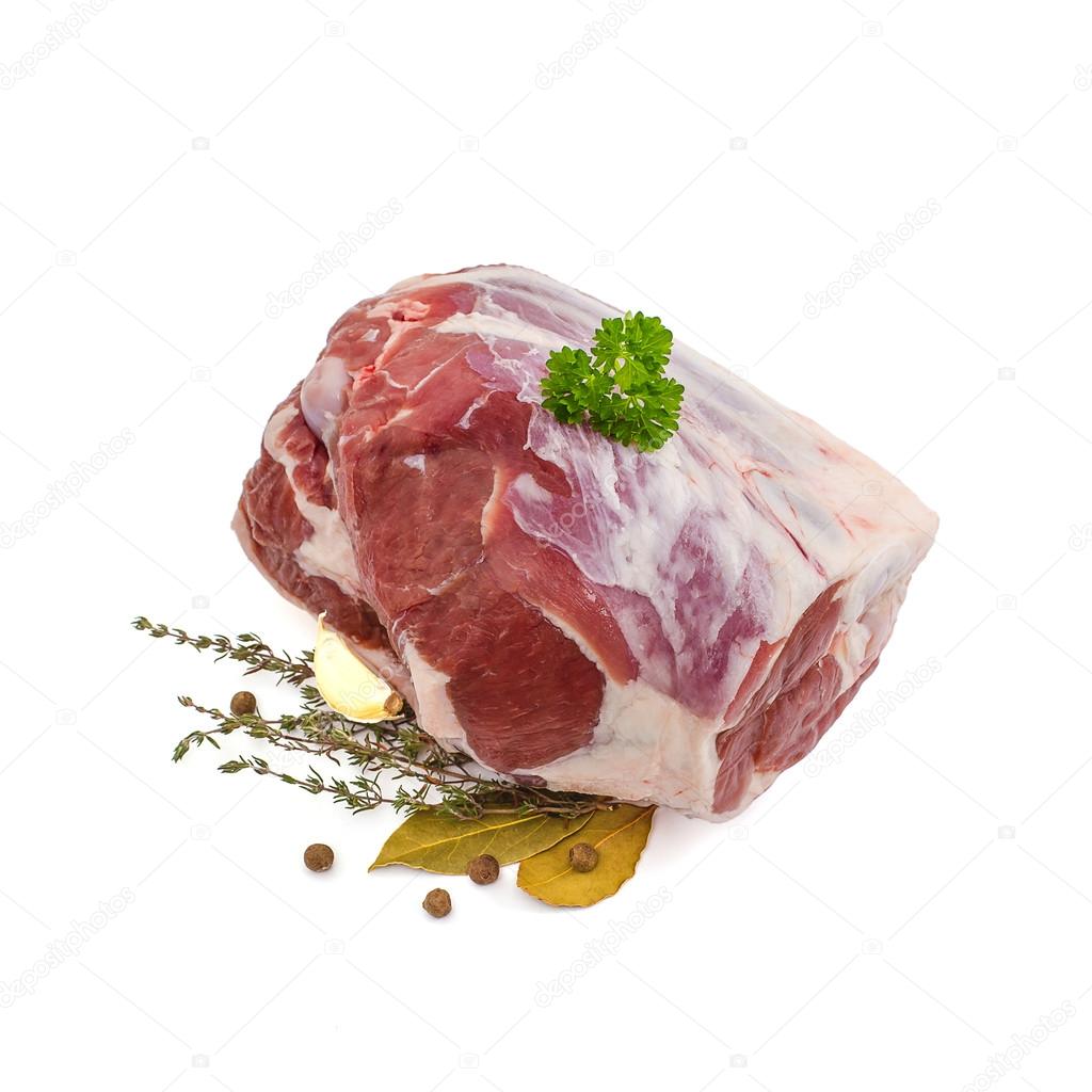 Raw lamb leg with bone, spices