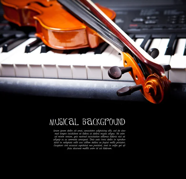 Violin on piano keys Stock Photos, Royalty Free Violin on piano keys